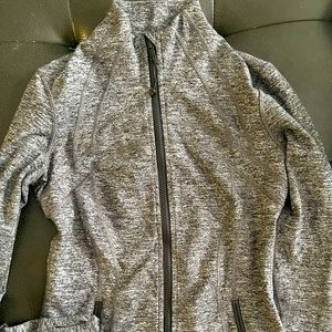 Lululemon size 8 running jacket, never worn, just pulled tags off.